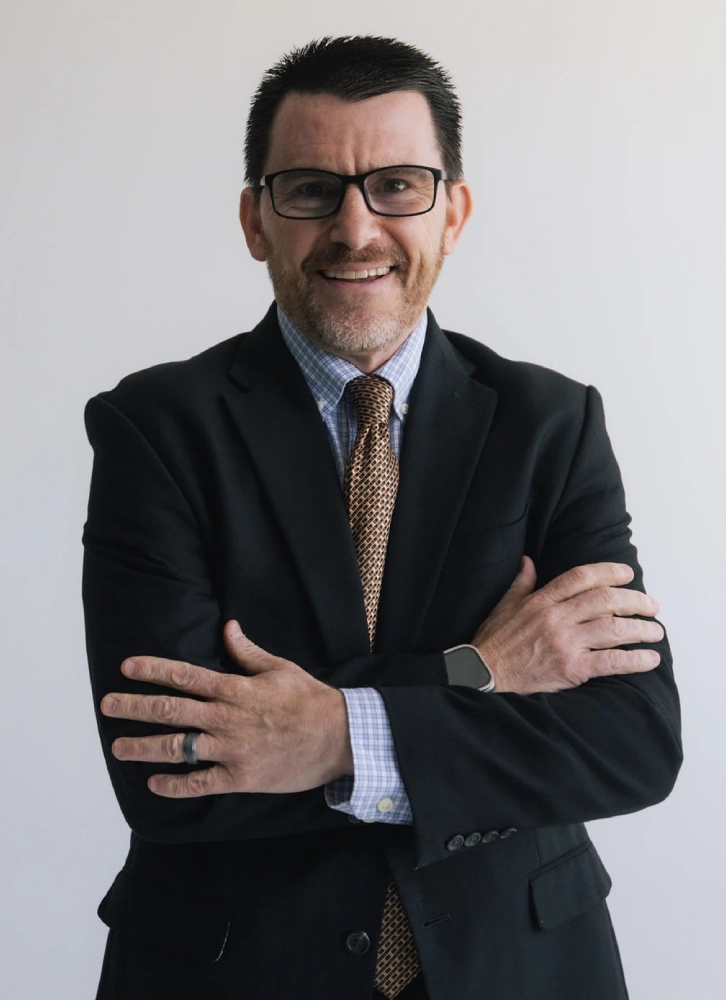Professional headshot of Dennis, team member at New Mexico Financial & Estate Planning Attorneys.